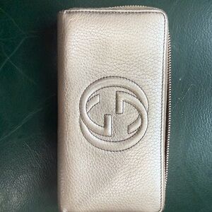 Gucci Silver Metallic Zip Wallet with Embossed Logo
